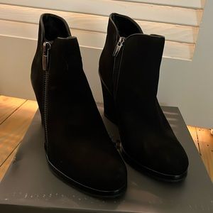 Brand new Vince Camuto wedge booties.  Black suede.  Double side zippers